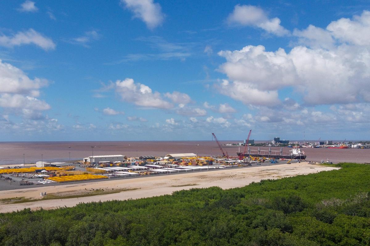 A drone view shows the Vreed en Hoop Shorebase Inc facility, part of Guyana's oil and gas infrastructure, in Vreed en Hoop on May 9. The country's fast-growing economy is set to benefit from a reshaped global energy market due to the U.S.-Israeli war on Iran.