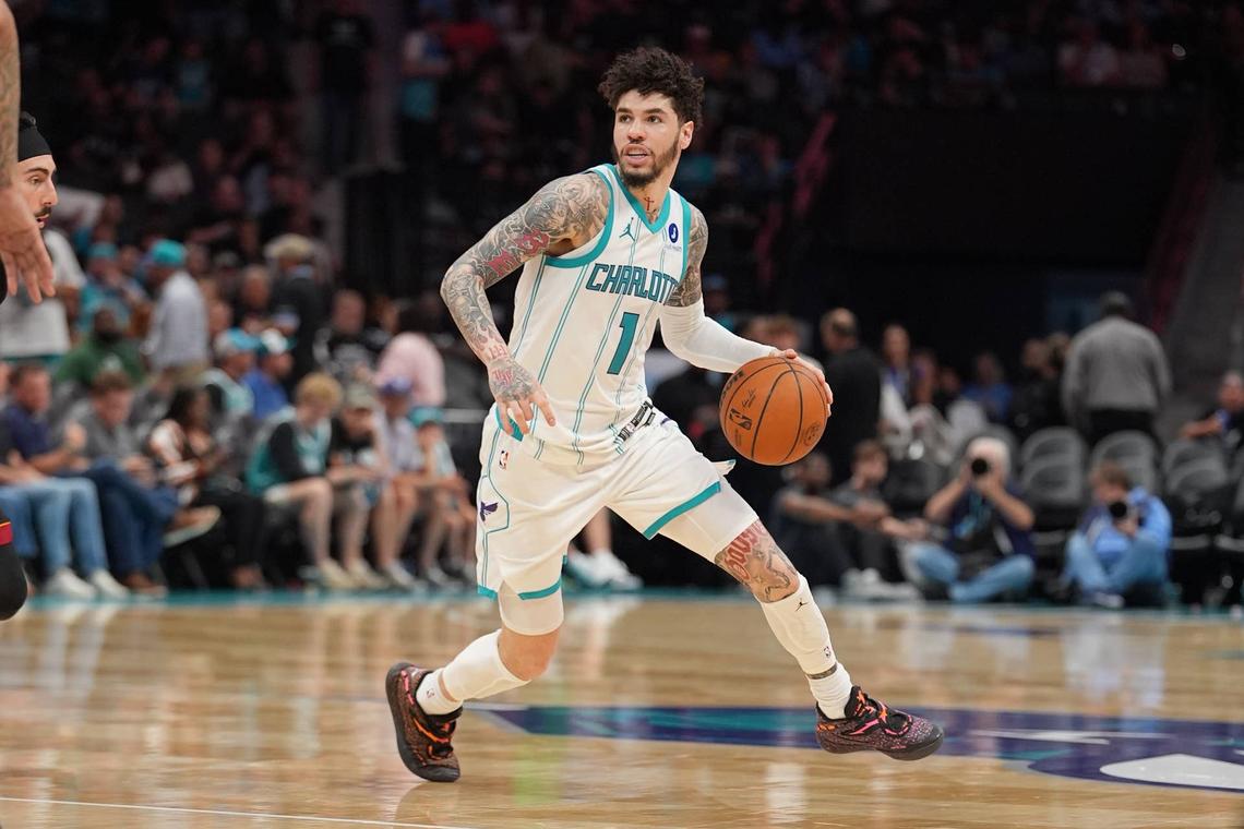  Apr 14, 2026; Charlotte, North Carolina, USA; Charlotte Hornets guard LaMelo Ball (1) moves the ball during the second half during the play-in rounds between the Charlotte Hornets and the Miami Heat of the 2026 NBA Playoffs at Spectrum Center. Mandatory Credit: Jim Dedmon-Imagn Images 