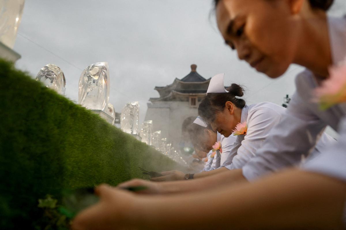 Buddhist Tzu Chi Foundation members commemorate the organization’s 60th anniversary during an annual Buddha bathing ceremony marking Buddha’s birthday, Mother’s Day and Global Tzu Chi Day at Chiang Kai-shek Memorial Hall in Taipei, Taiwan, May 10, 2026. REUTERS/Ann Wang
