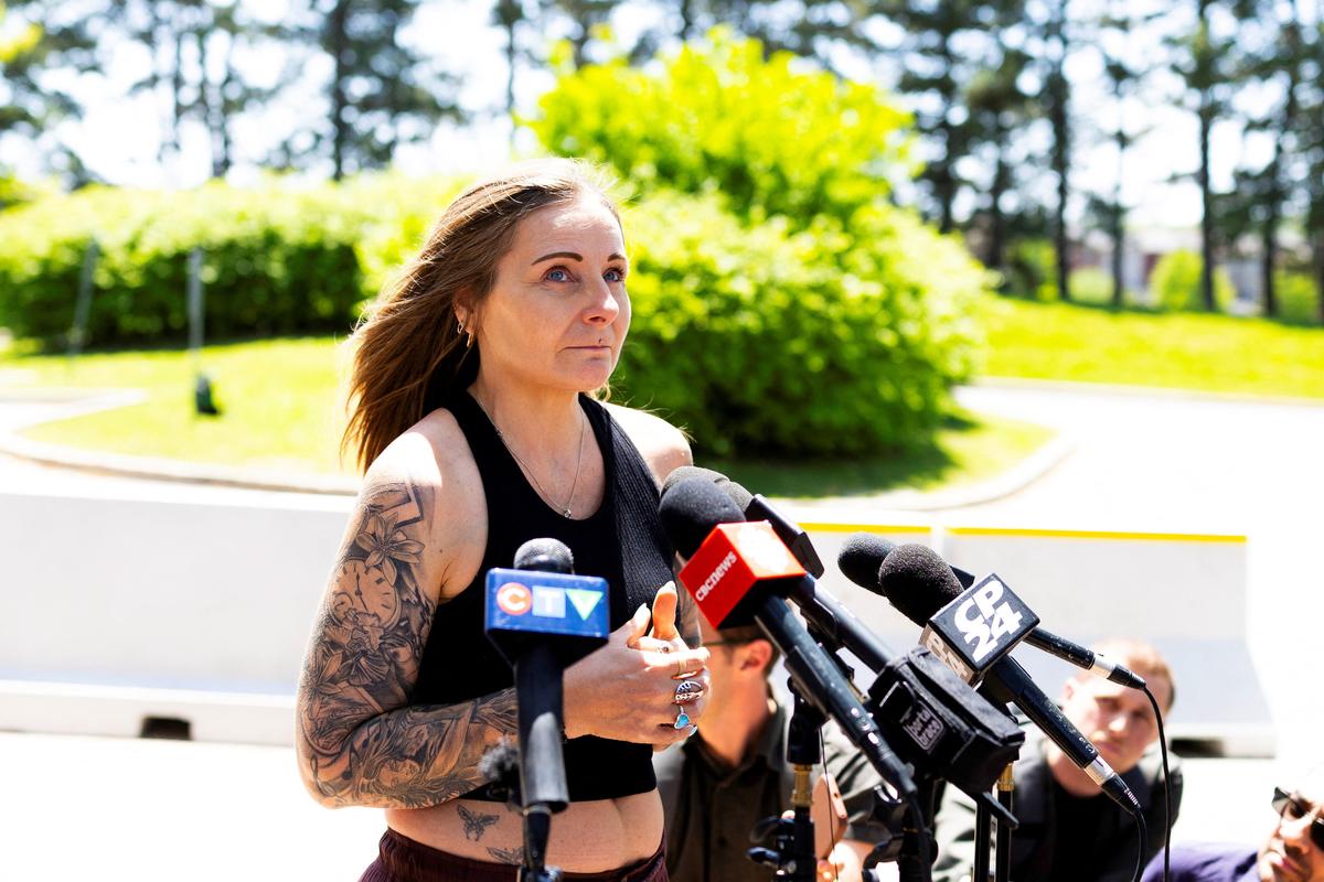 Kim Prosser speaks to the media about her son Ashtyn Prosser, a victim of Kenneth Law, outside the Superior Court of Justice, on a day when Law pleaded guilty to 14 counts of aiding suicide in Newmarket, Ontario, Canada May 29,  2026. REUTERS/Carlos Osorio.