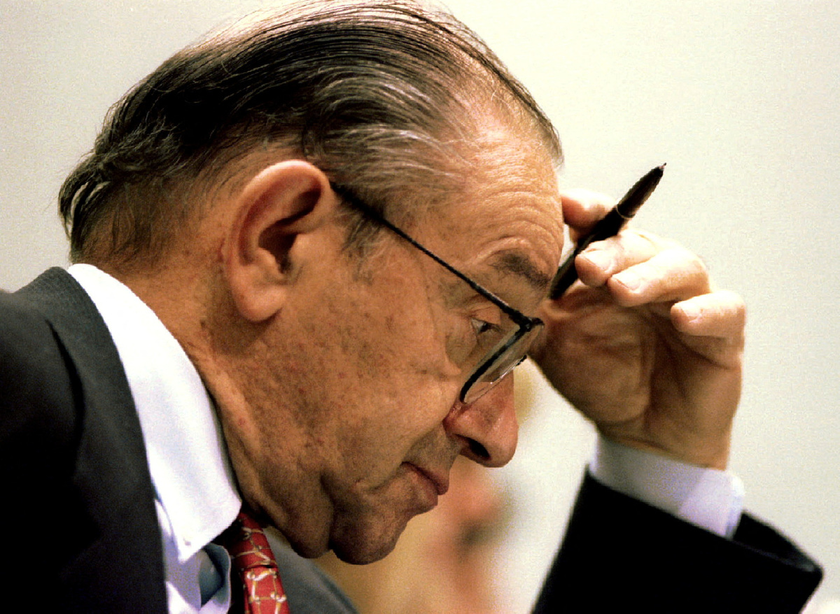 FILE PHOTO: Federal Reserve Chairman Alan Greenspan pauses during his testimony to the House Banking subcommittee in Washington December 5. REUTERS/Stephen Jaffe/File Photo