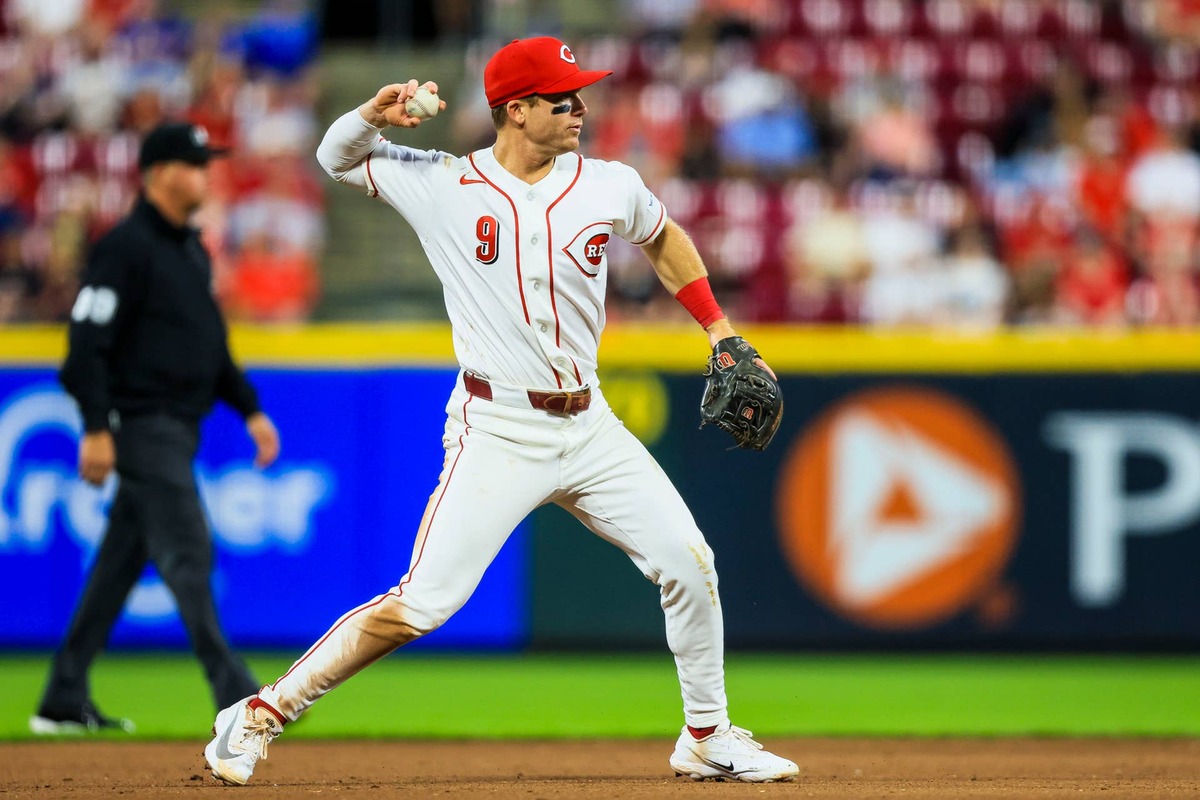  Jun 1, 2026; Cincinnati, Ohio, USA; Cincinnati Reds shortstop Matt McLain (9) throws to first to get Kansas City Royals outfielder Lane Thomas (not pictured) out in the seventh inning at Great American Ball Park. Mandatory Credit: Katie Stratman-Imagn Images 