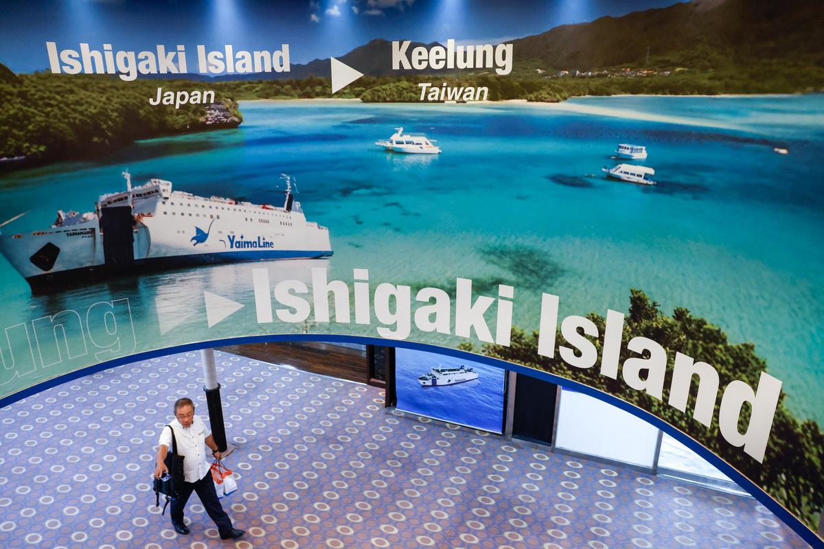 Government officials and members of the media attend a preview tour of the Yaima Maru ferry, which is set to operate between Taiwan and Japan's Ishigaki Island in Okinawa Prefecture,at Keelung, Taiwan, May 28, 2026. REUTERS/Ann Wang