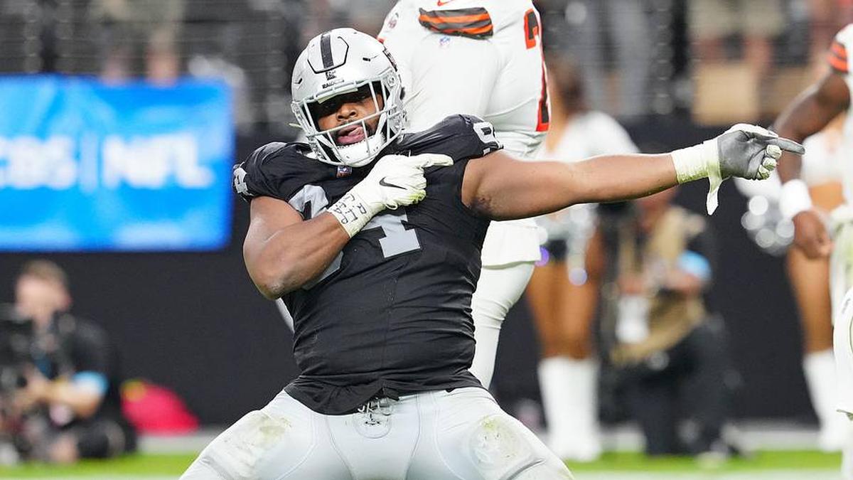  Sep 29, 2024; Paradise, Nevada, USA; Las Vegas Raiders defensive tackle Christian Wilkins (94) celebrates after a penalty overturned a scoring play by the Cleveland Browns during the fourth quarter at Allegiant Stadium. Mandatory Credit: Stephen R. Sylvanie-Imagn Images | Stephen R. Sylvanie-Imagn Images 