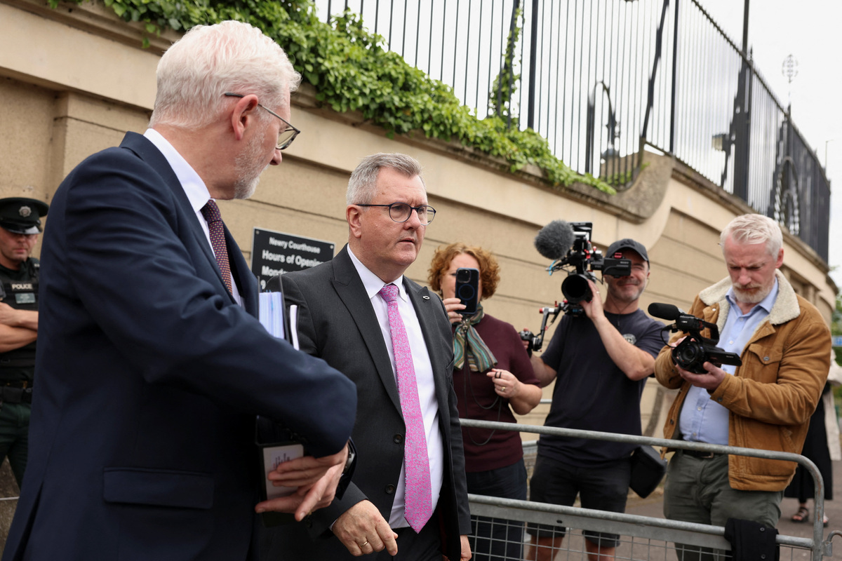 Jeffrey Donaldson, former leader of the Democratic Unionist Party (DUP), charged with historical sex offences, leaves the Newry Courthouse as he appeared for trial, in Newry, Northern Ireland, June 17, 2026. REUTERS/Cathal McNaughton