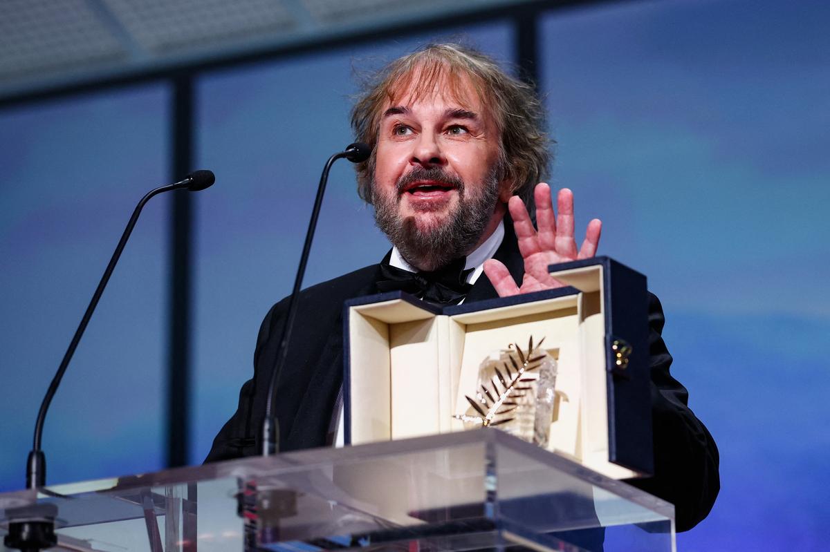 New Zealand filmmaker Peter Jackson with an Honorary Palme d'Or Award during the opening ceremony and the screening of the film "La Venus electrique" (The Electric Kiss) Out of competition at the 79th Cannes Film Festival in Cannes, France, May 12, 2026. REUTERS/Gonzalo Fuentes