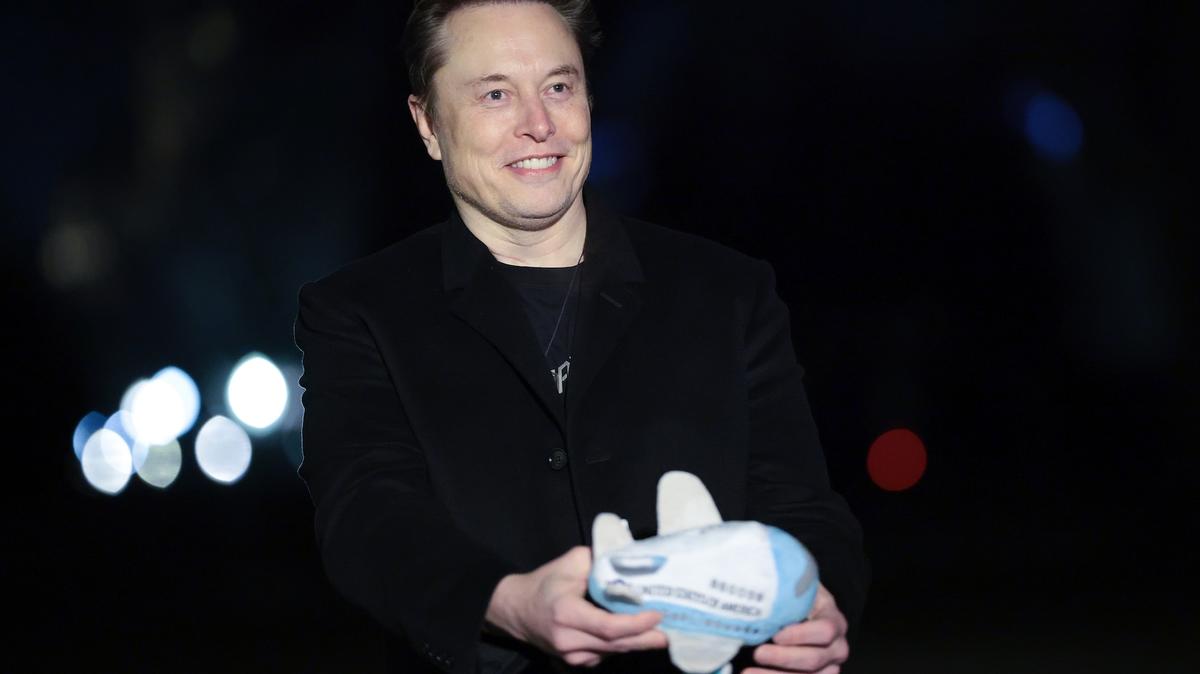 Tesla and SpaceX CEO Elon Musk holds up an Air Force One stuffed toy as he walks from the presidential helicopter Marine One on the South Lawn of the White House Feb. 19, 2025 in Washington, D.C. Musk has made a $10 million endorsement in Kentucky’s U.S. Senate race.