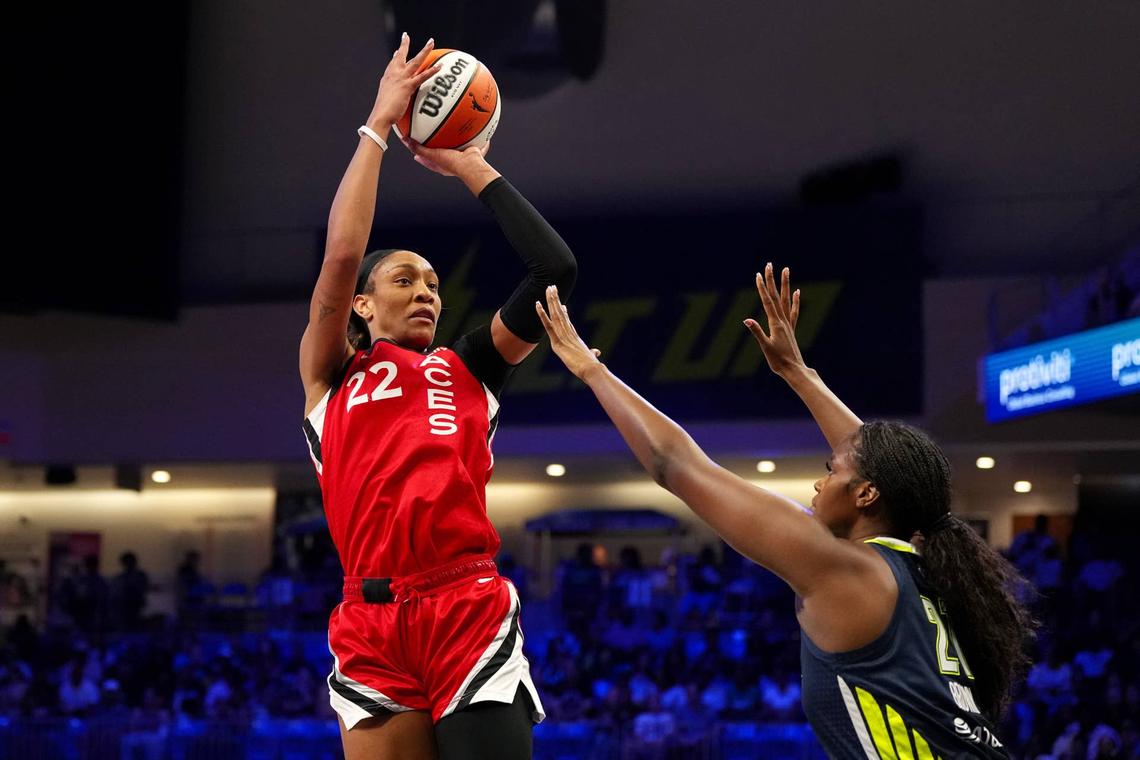  ARLINGTON, TEXAS - AUGUST 27: A'ja Wilson #22 of the Las Vegas Aces shoots over Kalani Brown #21 of the Dallas Wings during the first half at College Park Center on August 27, 2024 in Arlington, Texas. (Photo by Sam Hodde/Getty Images) 