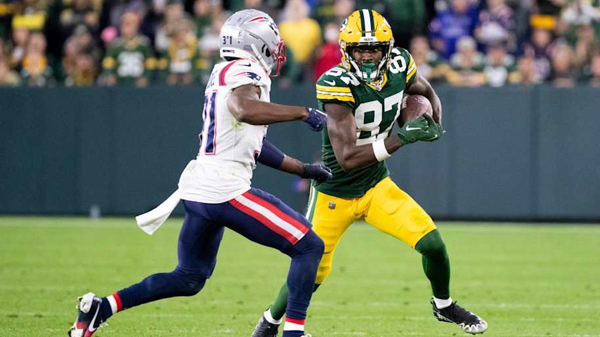  Green Bay Packers wide receiver Romeo Doubs (87) runs the ball against New England Patriots cornerback Jonathan Jones (31) in overtime on Sunday, Oct. 2, 2022, at Lambeau Field in Green Bay, Wis. Samantha Madar/USA TODAY NETWORK-Wis. Gpg Packers Vs Patriots 10022022 0004 | Samantha Madar/USA TODAY NETWORK-Wisconsin / USA TODAY NETWORK 