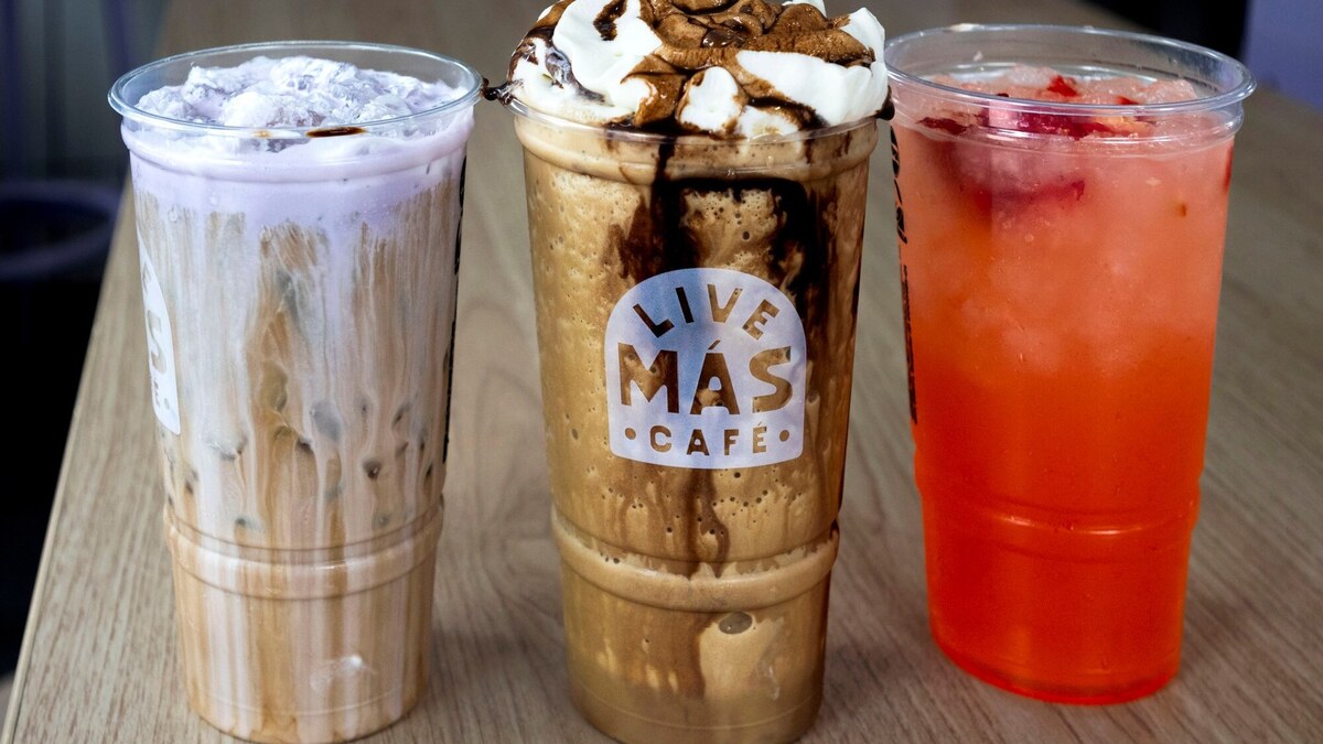 The Purple Velvet Cream Cold Brew, Mexican Mocha Latte Chiller and the Strawberry Passionfruit Lemonaid, from left, are available at the Taco Bell Live Mas Cafe on Campus Drive in Irvine. (Photo by Paul Bersebach, Orange County Register/SCNG)