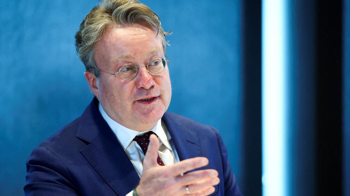 FILE PHOTO: European Central Bank governing council member Olaf Sleijpen speaks at press conference for the publication of Dutch central bank's annual report in Amsterdam, Netherlands, March 24, 2026. REUTERS/Piroschka van de Wouw/File Photo