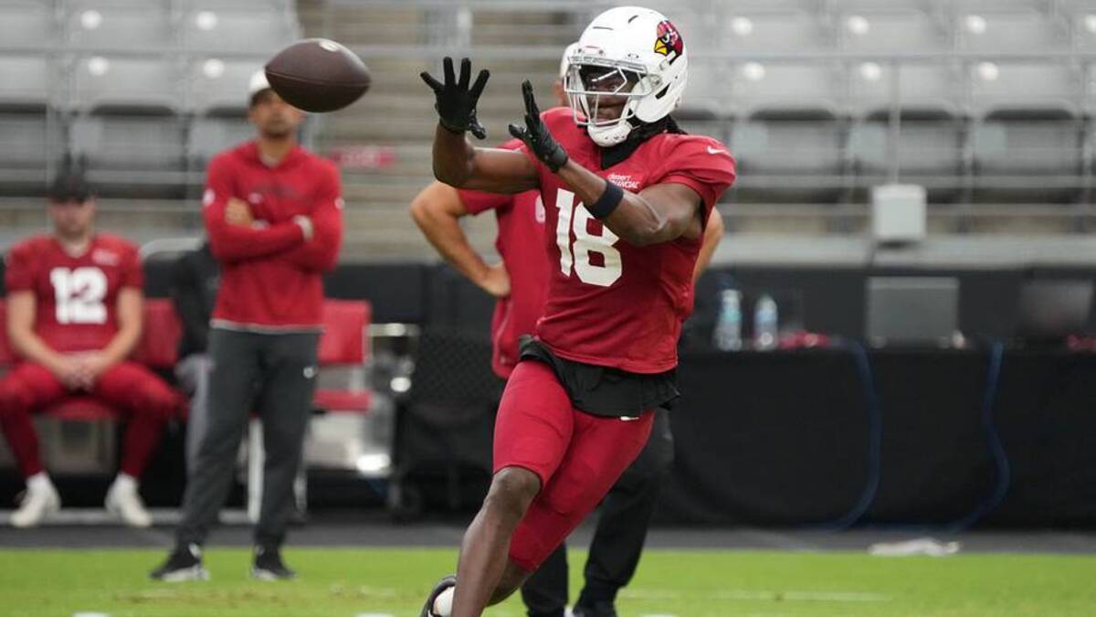Arizona Cardinals receiver Marvin Harrison Jr. (18) catches a pass during training camp at State Farm Stadium in Glendale on