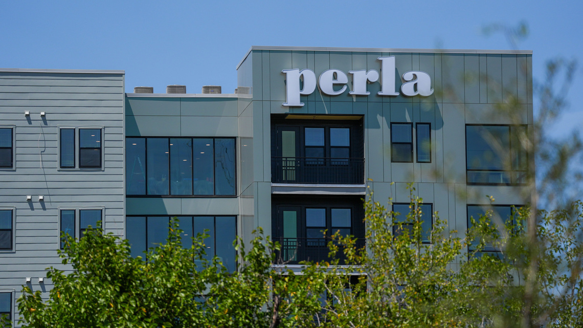 Perla Apartments delay move in, students displaced after classes start 