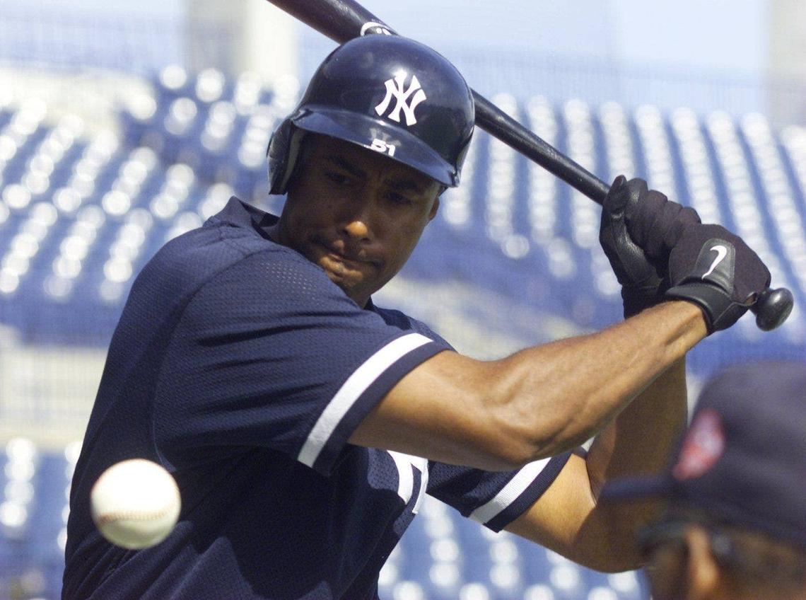  New York Yankees outfielder Bernie Williams practices his swing before a spring training game in Tampa, Florida, in 2001. Imagn Images