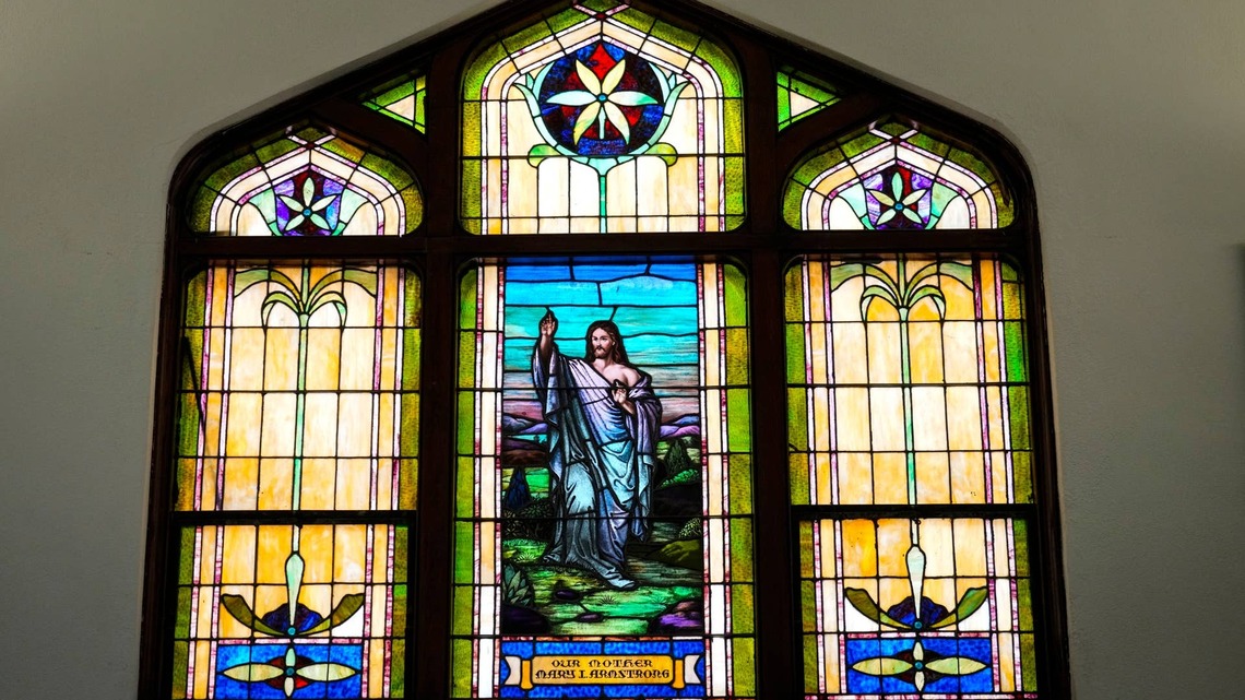 Woman Turns Old Church Pews Into the Library Wall of Our Dreams 