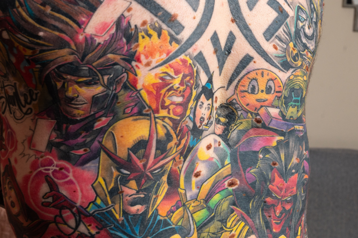  Tom Radford's body is covered in Marvel-themed tattoos. (Charley Atkins via SWNS) 