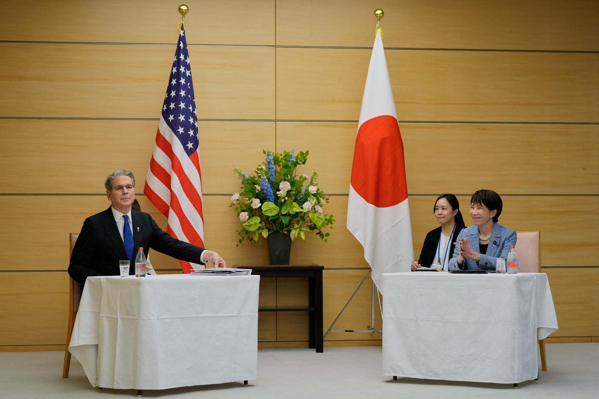 U.S. Treasury Secretary Scott Bessent and Japanese Prime Minister Sanae Takaichi prepare to attend a meeting at the prime minister's office in Tokyo, Japan, May 12, 2026.    Eugene Hoshiko/Pool via REUTERS