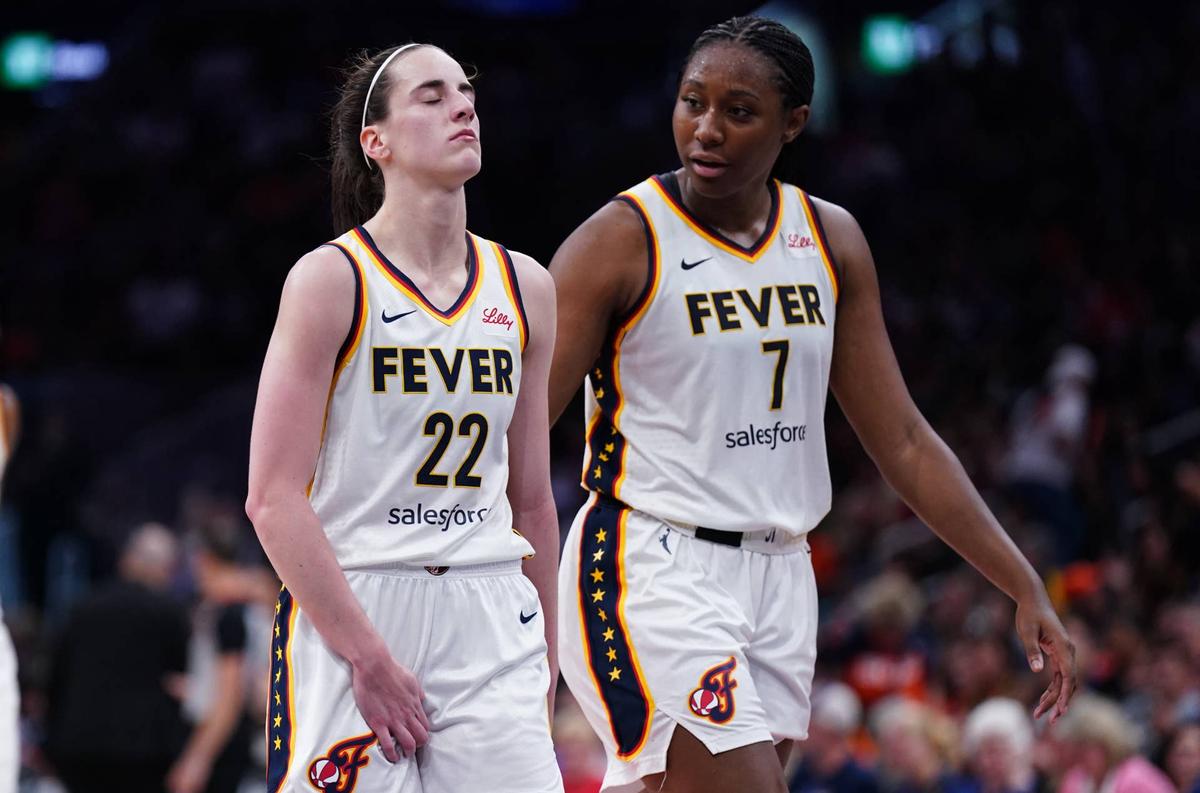  Indiana Fever guard Caitlin Clark (22) reacts with a possible injury after a play against the Connecticut Sun in the second half at TD Garden. David Butler II-Imagn Images