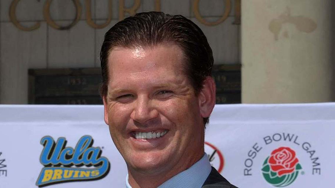  Oct 12, 2010; Pasadena, CA, USA; UCLA Bruins athletic director Dan Guerrero (left), Cade McNown (center), and Tournament of Roses president Jeff Throop (right) at a press conference to announce the $152 million Rose Bowl renovation at the Rose Bowl. Mandatory Credit: Kirby Lee/Image of Sport-Imagn Images | Kirby Lee-Imagn Images 