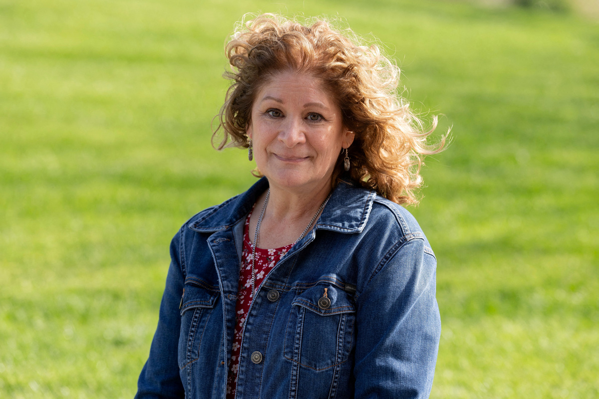 FILE PHOTO: Kate Mottl, a Trump voter, poses for a portrait in Bolingbrook, Illinois, U.S. May 7, 2025.  REUTERS/Vincent Alban/File Photo