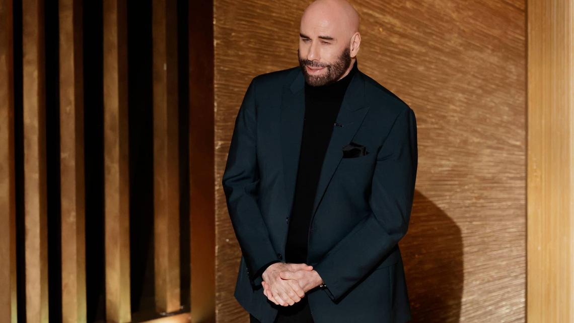 John Travolta Debuted Another New Beret on the Cannes Red Carpet After Crying Onstage and We Love It 