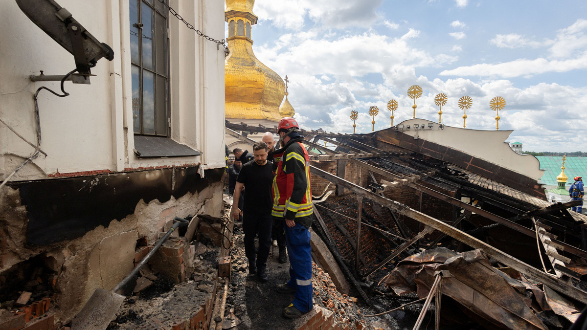 Ukraine's President Volodymyr Zelenskiy visits the Dormition Cathedral of the Kyiv Pechersk Lavra, which was hit during Russian missile and drone strikes, amid Russia's attack on Ukraine, in Kyiv, Ukraine June 15, 2026. Ukrainian Presidential Press Service/Handout via REUTERS