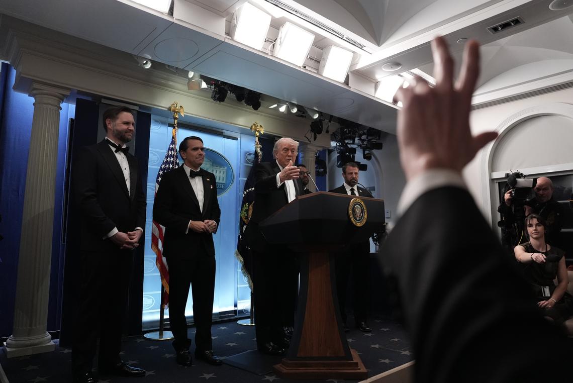 President Donald Trump briefs reporters at the White House after shots were fired during the White House Correspondents' Association dinner at the Washington Hilton in Washington on Saturday, April 25, 2026. He is joined by, from left: Vice President JD Vance; Acting Attorney General Todd Blanche; FBI Director Kash Patel; and Homeland Security Secretary Markwayne Mullin. (Salwan Georges/The New York Times)