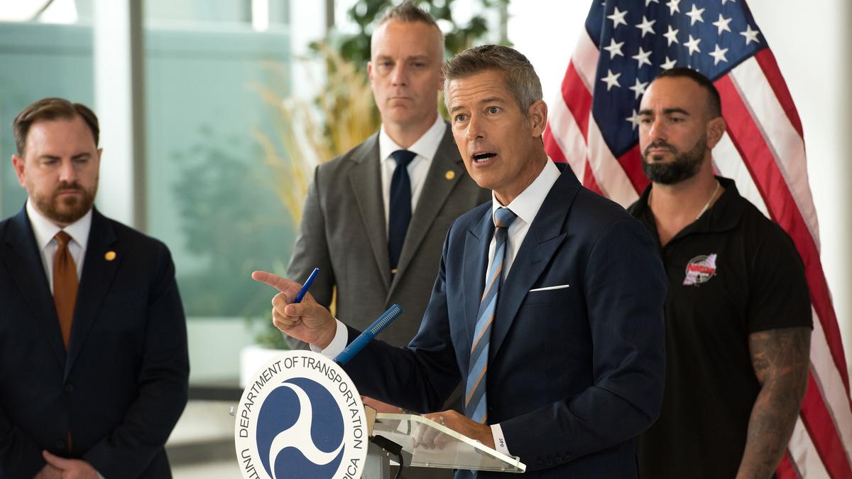 U.S. Dept. of Transportation Secretary Sean Duffy speaking alongside air traffic controllers union leaders at LaGuardia Airport in New York. (Evan Simko-Bednarski/New York Daily News/TNS)