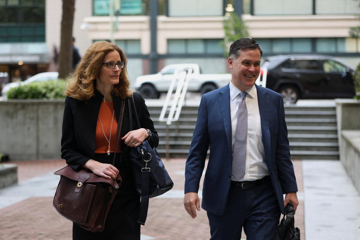 OpenAI's attorneys Sarah Eddy and Bradley R. Wilson arrive at a federal courthouse to attend the trial in Elon Musk's lawsuit over OpenAI's for-profit conversion, in Oakland, California, U.S., May 5, 2026. REUTERS/Manuel Orbegozo