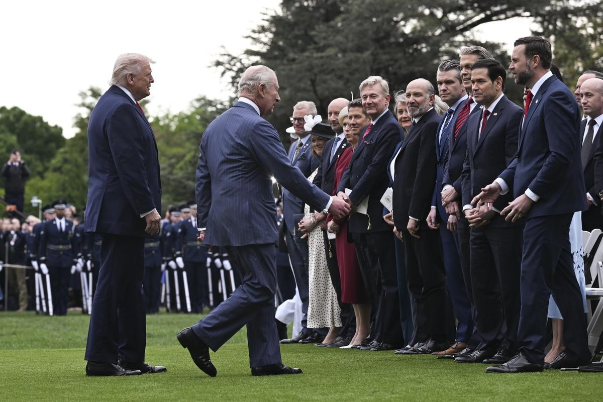 President Donald Trump watches as King Charles III greets Vice President JD Vance during an arrival ceremony on the South Lawn of the White House in Washington, on Tuesday, April 28, 2026. (Kenny Holston/The New York Times)