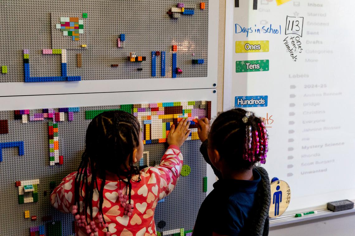  First grade students work on a Lego wall in a classroom at McKinley STEAM Academy. Credit: Sylvia Jarrus for The Hechinger Report