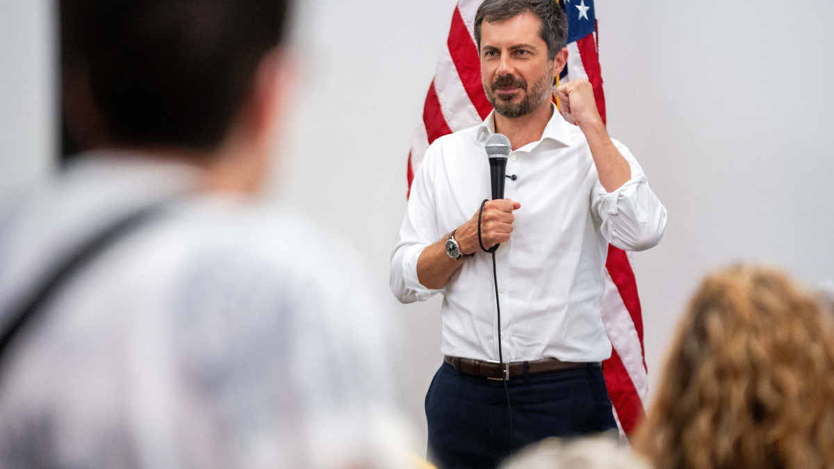 Former U.S. Secretary of Transportation Pete Buttigieg speaks to phone bank volunteers for Sarah Trone Garriott in Des Moines on July 13, 2026,