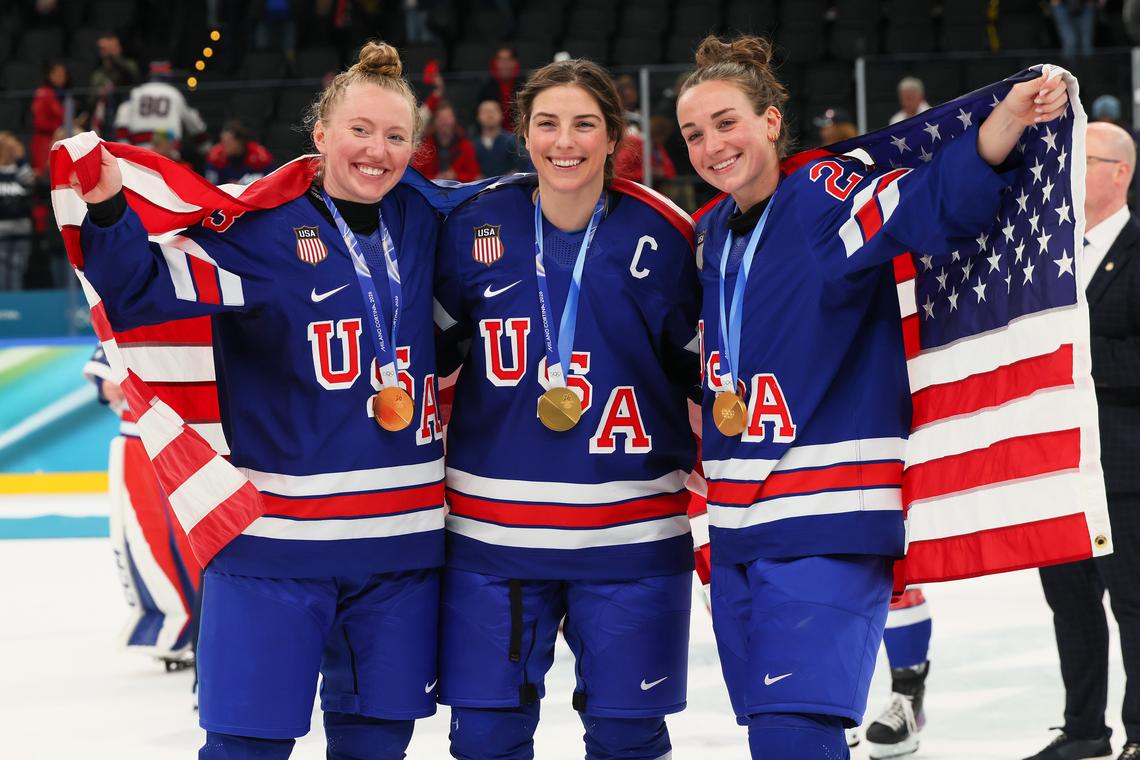  Gold medalists Grace Zumwinkle #13, Hilary Knight #21 and Taylor Heise #27 of Team United States.Photo by Bruce Bennett/Getty Images 