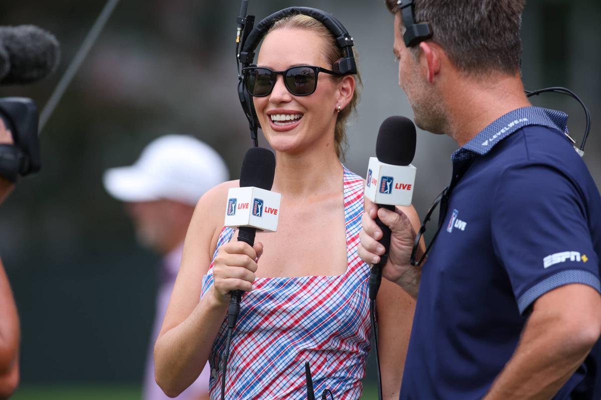  Aug 21, 2025; Atlanta, Georgia, USA; Reporter Paige Spiranac on the first hole during the first round of the TOUR Championship golf tournament. Mandatory Credit: Brett Davis-Imagn Images 
