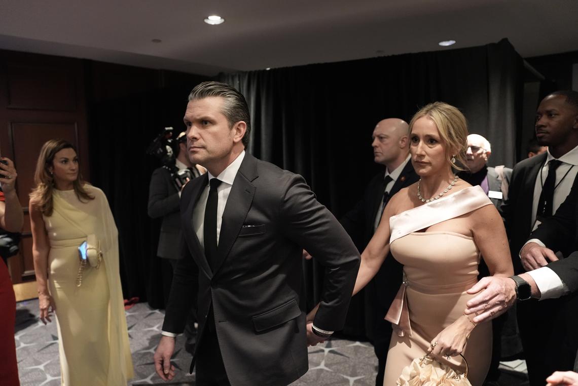 Defense Secretary Pete Hegseth and his wife, Jennifer Rauchet, at the Washington Hilton during the White House Correspondents' Association dinner in Washington on Saturday, April 25, 2026. President Trump was rushed out of the White House correspondents' dinner on Saturday night after reports of gunfire. (Salwan Georges/The New York Times)