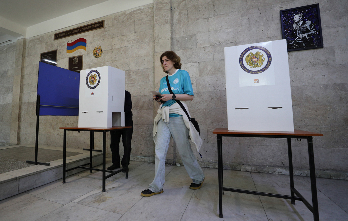 People visit a polling station during a parliamentary election in Yerevan, Armenia, June 7, 2026. Vahram Baghdasaryan/Photolure via REUTERS
