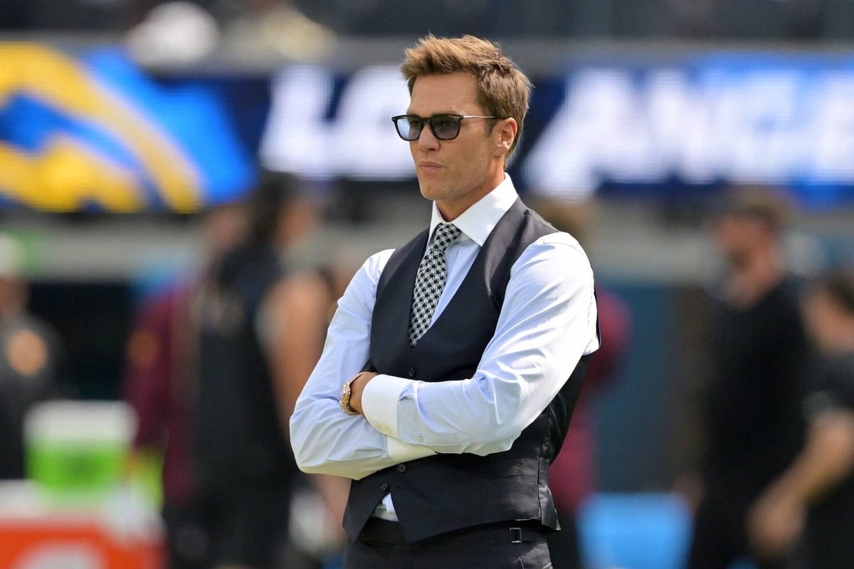  Oct 5, 2025; Inglewood, California, USA; Tom Brady looks on before the game between the Los Angeles Chargers and the Washington Commanders at SoFi Stadium. Mandatory Credit: Jayne Kamin-Oncea-Imagn Images 