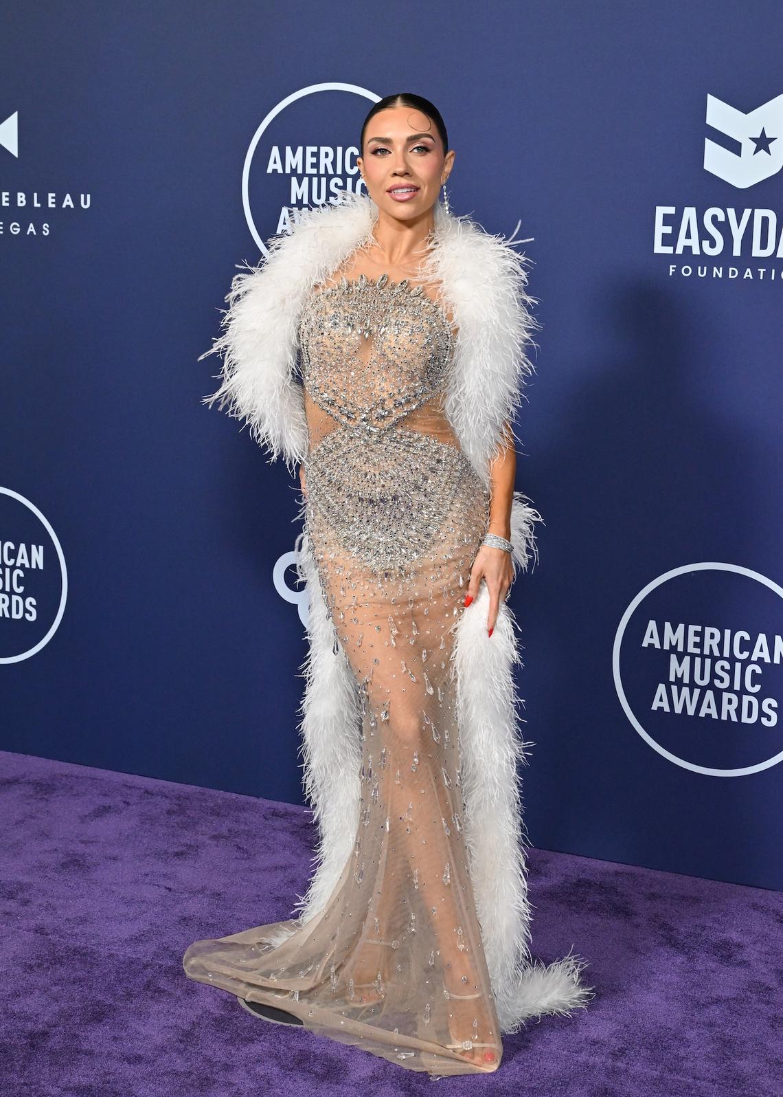 Jenna Johnson Dancing With the Stars' Jenna Johnson brought the sparkle to the red carpet in a beaded dress with a fur shawl. Axelle/Bauer-Griffin/FilmMagic