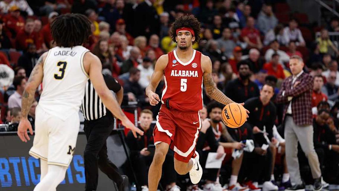  Mar 27, 2026; Chicago, IL, USA; Alabama Crimson Tide forward Amari Allen (5) drives the ball in the first half against the Michigan Wolverines during a Sweet Sixteen game of the Midwest Regional of the men's 2026 NCAA Tournament at United Center. Mandatory Credit: Kamil Krzaczynski-Imagn Images | Kamil Krzaczynski-Imagn Images 