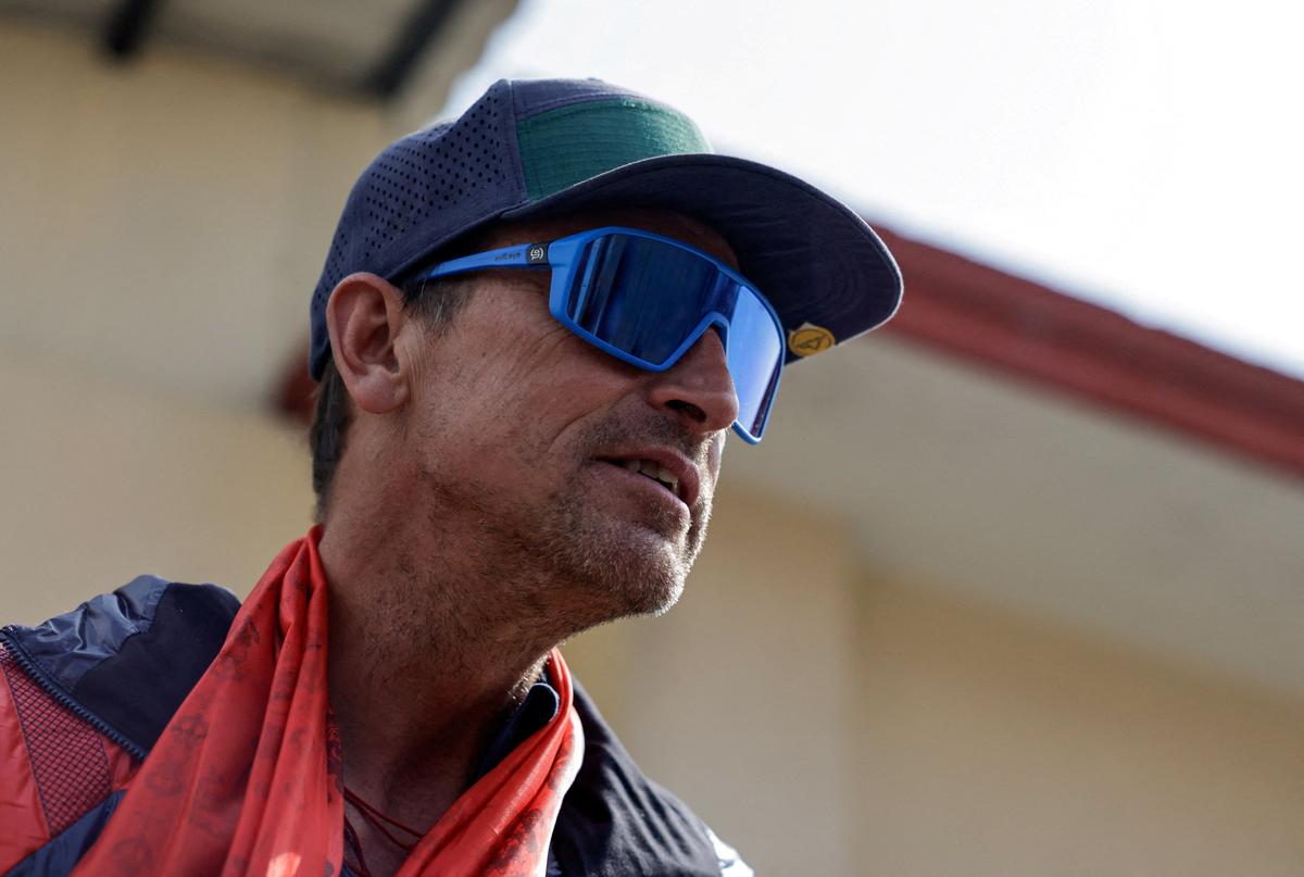 FILE PHOTO: British climber Kenton Cool speaks to the media after returning to Kathmandu following his 20th ascent of Mount Everest, the most by any foreign climber, Nepal, May 24, 2026. REUTERS/Navesh Chitrakar/File Photo