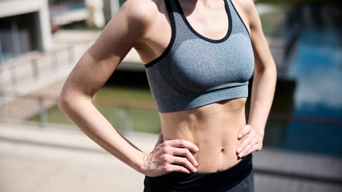 We Asked 3 Pilates Instructors How To Get That ‘Flat Abs' Look-and They All Said the Same Thing 