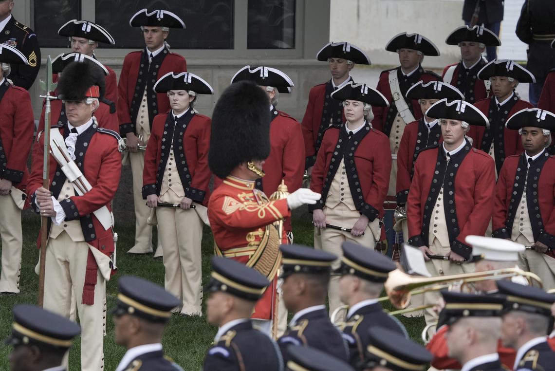 Members of the U.S. Army Old Guard Fife and Drum Corps at an arrival ceremony for King Charles III and Queen Camilla on the South Lawn of the White House in Washington, on Tuesday, April 28, 2026. (Salwan Georges/The New York Times)