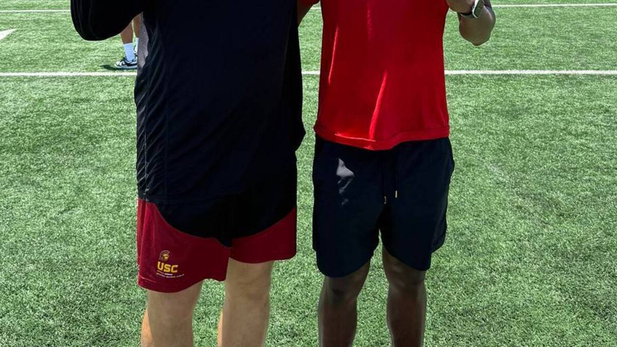  Allen (Texas) 2029 quarterback Ty Snell and USC Trojans offensive coordinator Luke Huard | Photo Courtesy of Ty Snell 
