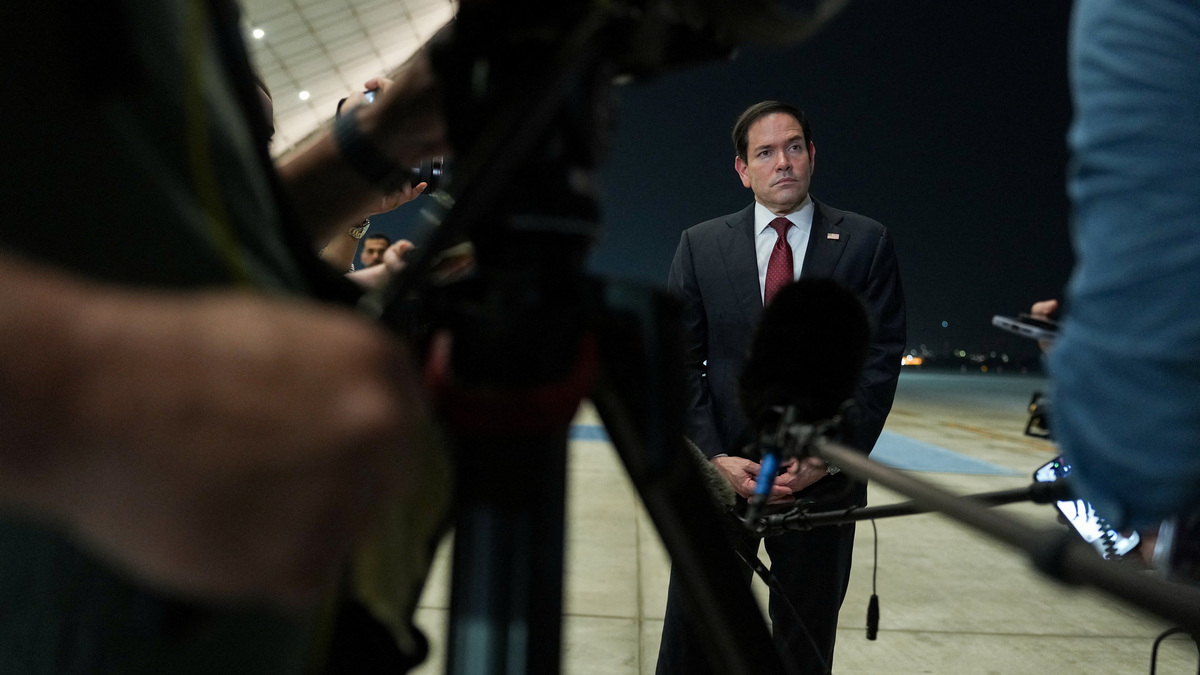 Secretary of State Marco Rubio speaks to the media upon his arrival at Al Bateen Executive Airport in Abu Dhabi, United Arab Emirates, on Tuesday to discuss the interim deal between the U.S. and Iran with Arab Gulf allies.