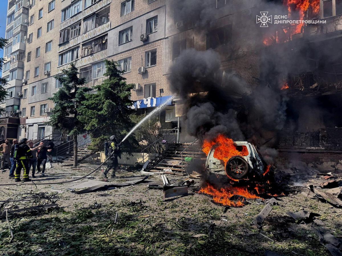 Rescuers work at a site of an apartment building hit by a Russian drone strike, amid Russia's attack on Ukraine, amid Russia's attack on Ukraine, in the town of Pavlohrad, Dnipropetrovsk region, Ukraine in this handout picture released May 25, 2026. Press service of the State Emergency Service of Ukraine in Dnipropetrovsk region/Handout via REUTERS