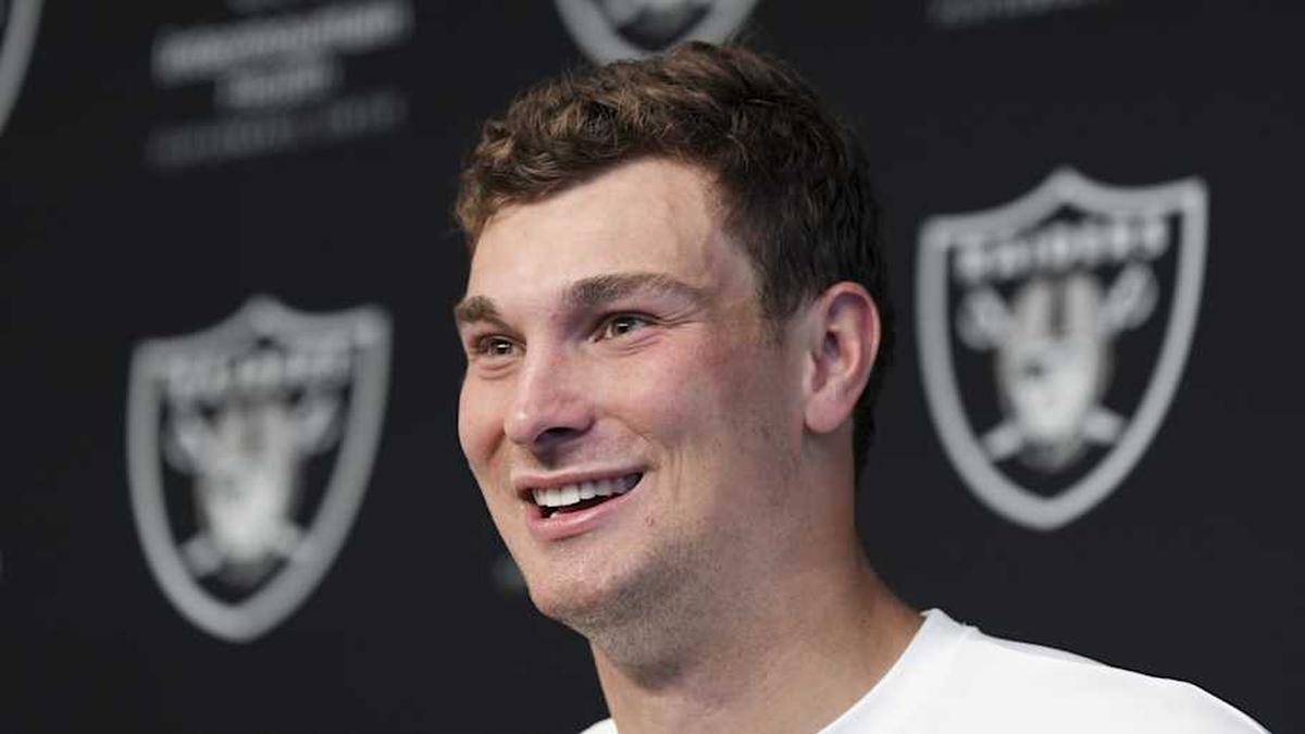 May 2, 2026; Henderson, NV, USA; Las Vegas Raiders quarterback Fernando Mendoza (15) speaks during a news conference at the team's Rookie Minicamp at Intermountain Health Performance Center. Mandatory Credit: Candice Ward-Imagn Images | Candice Ward-Imagn Images 