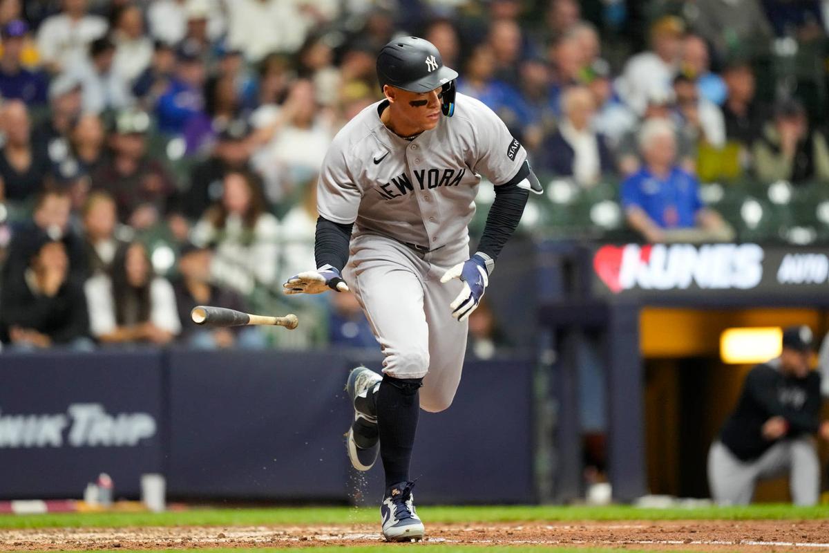  May 8, 2026; Milwaukee, Wisconsin, USA; New York Yankees right fielder Aaron Judge (99) singles during the ninth inning against the Milwaukee Brewers at American Family Field. Mandatory Credit: Jeff Hanisch-Imagn Images 