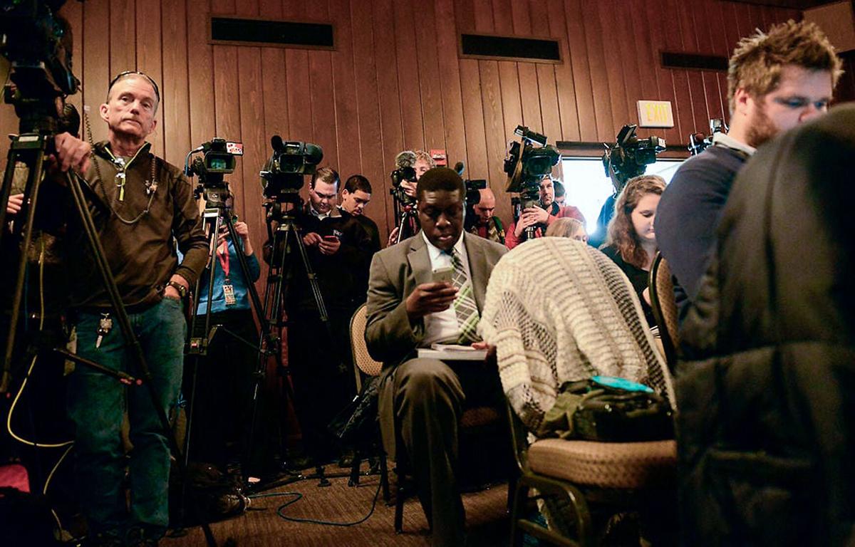Media wait at an emergency meeting of the UM System Board of Curators on Nov. 9, 2015, at the Old Alumni Center. Then-UM System President Tim Wolfe officially resigned at the start of the meeting, a day after the rest of the Missouri football team joined the boycott, which caused the story to get national coverage. Media faced coverage troubles as the Concerned Student 1950 group told protesters not to talk to reporters and refused to give media access to their tent camp on Mel Carnahan Quadrangle.