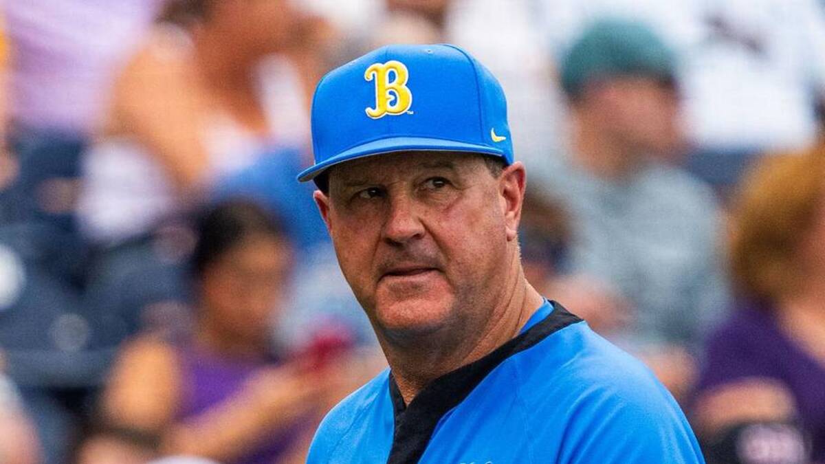  Jun 16, 2025; Omaha, Neb, USA; UCLA Bruins head coach John Savage walks off the field before the game against the LSU Tigers at Charles Schwab Field. Mandatory Credit: Dylan Widger-Imagn Images | Dylan Widger-Imagn Images 