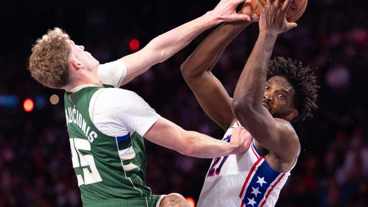 Joel Embiid posts triple-double, 76ers handle Bucks